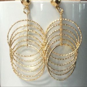 Gorgeous gold floating hoops earrings new